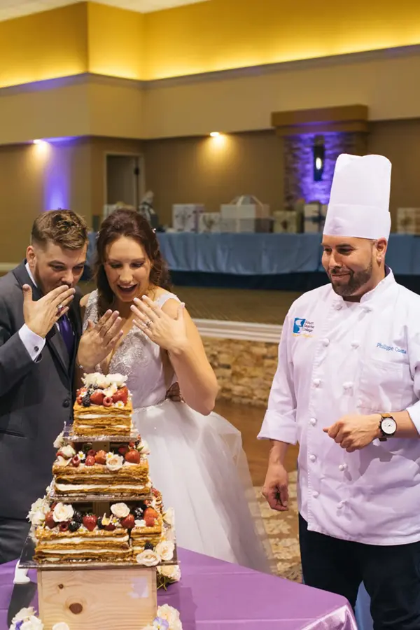 Bride and groom react to specialty cake