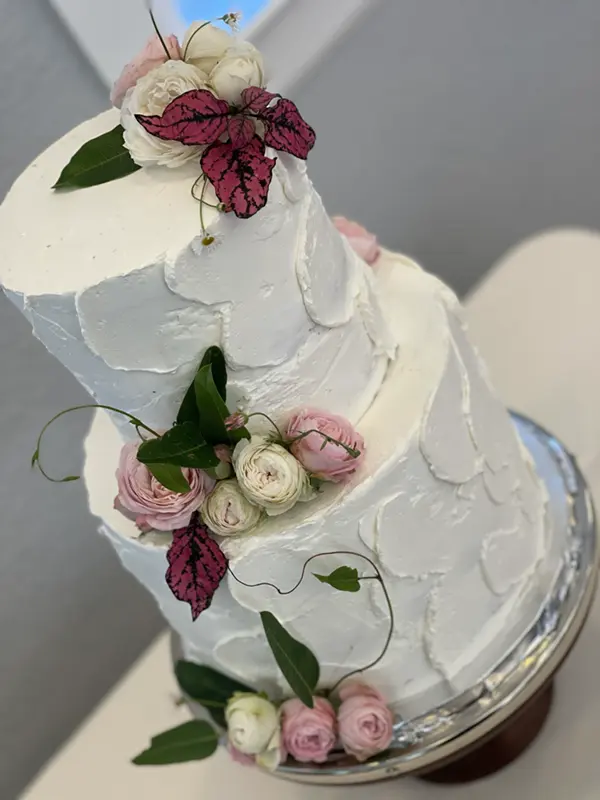 White and flower specialty cake